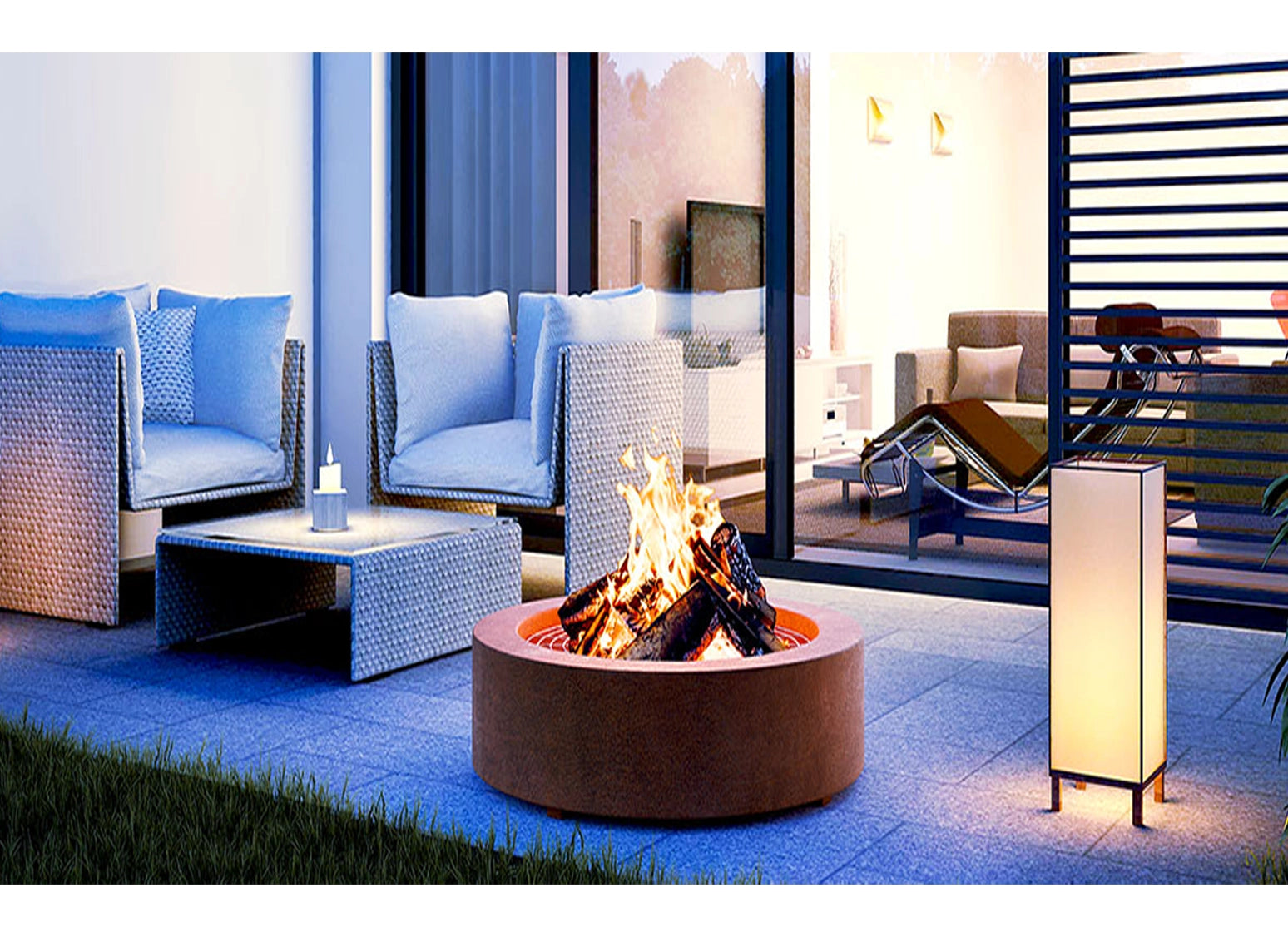 Runde Feuerschale aus Cortenstahl stilvoll auf einer Terrasse inszeniert, dekorative Feuerstelle und modernes Feuerobjekt mit Edelrost-Patina als markanter Blickfang im Außenbereich.